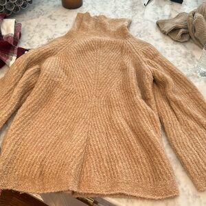 Beige turtleneck theory sweater